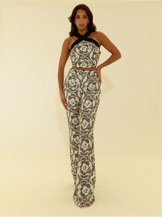 Calça Flare Scripta de Lantejoulas