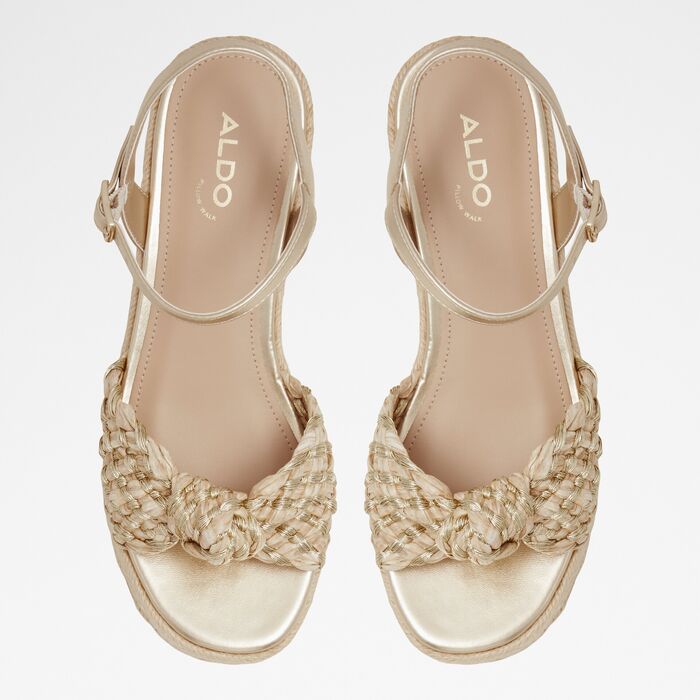 Wedge heeled sandals in gold - ANNAMARIE
