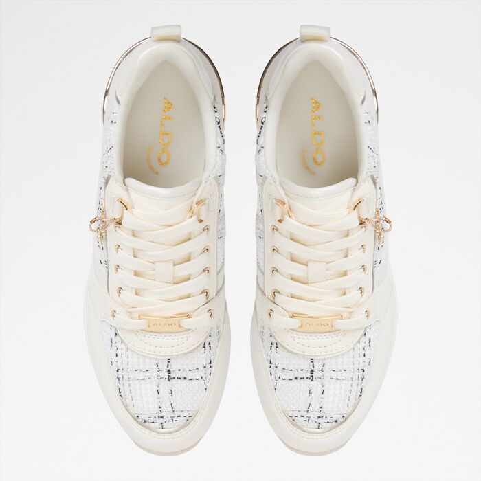 Wedge heeled trainers in white - CAROTERIEL