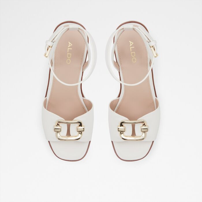 Wedge heeled sandals in white - CARRABRIRIA