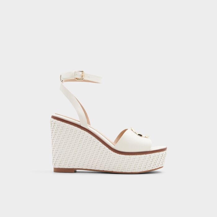 Wedge heeled sandals in white - CARRABRIRIA