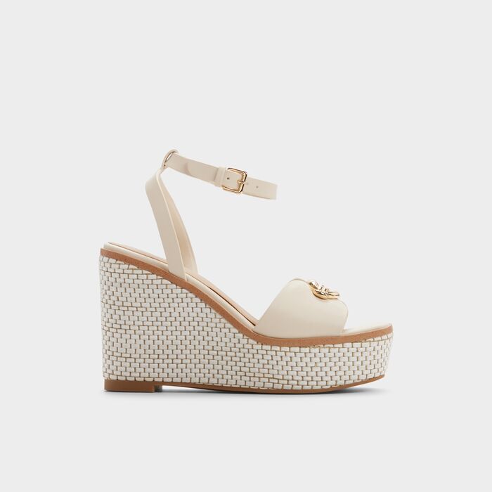 Wedge heeled sandals in beige - CARRABRIRIEL