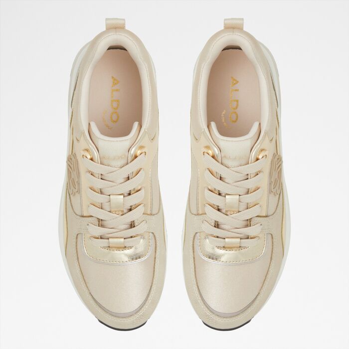 Flat trainers in gold - CLEA
