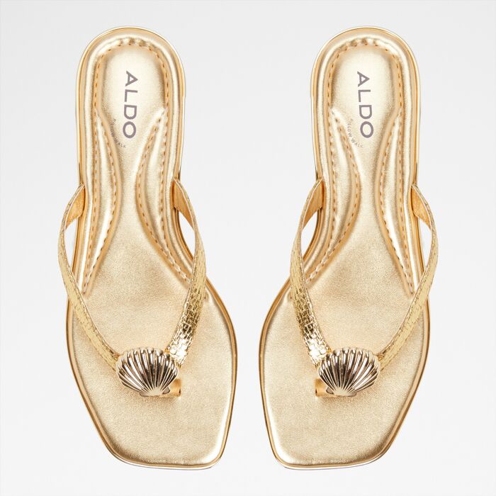 Flat sandals in gold - CONCHIGLIA