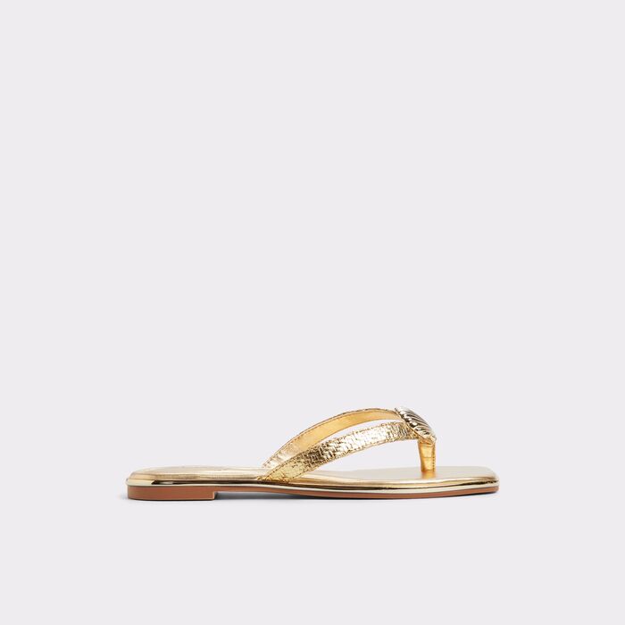 Flat sandals in gold - CONCHIGLIA