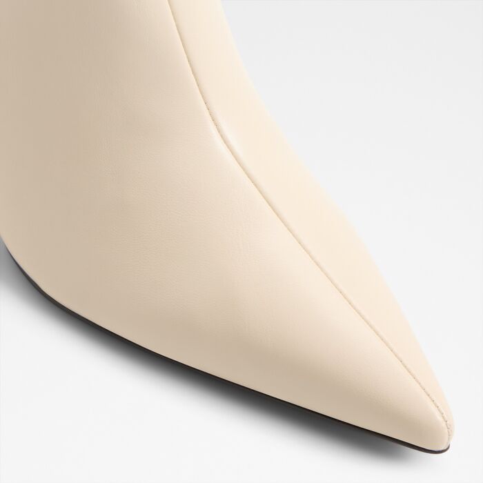 Stiletto heeled ankle boots in white - DAHLYAA