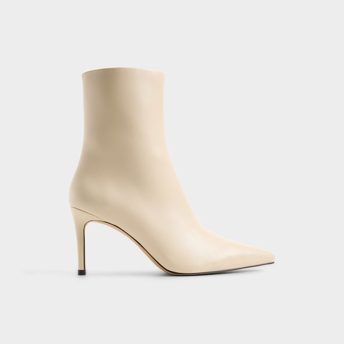 Stiletto heeled ankle boots in white - DAHLYAA