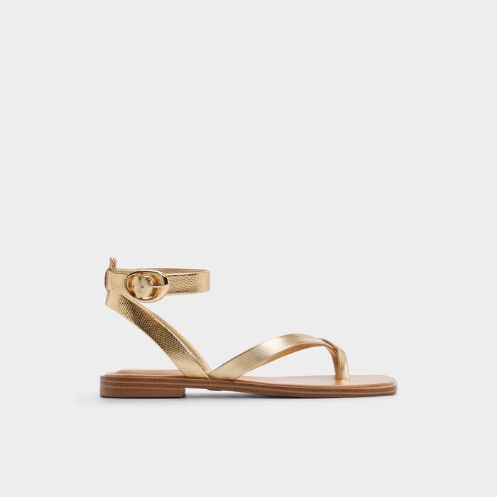 Flat sandals in gold - DARESSI