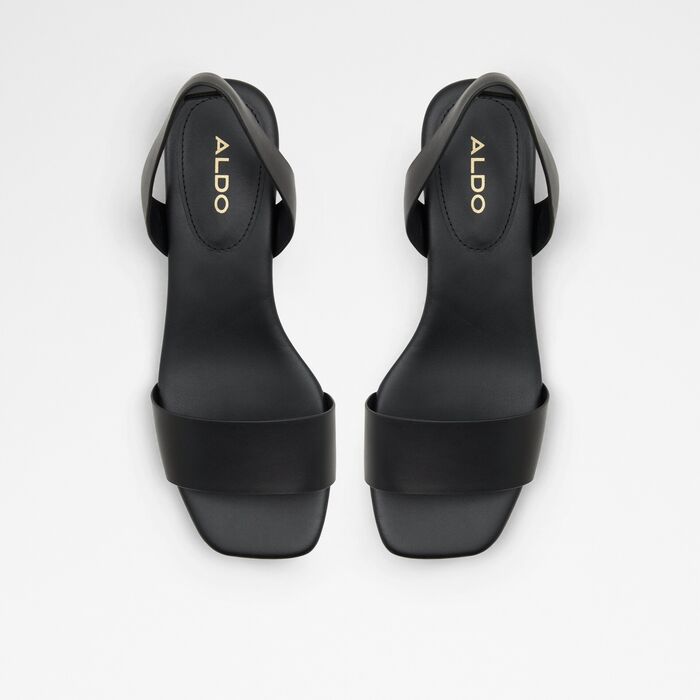 Flat sandals in black leather - DORENNA