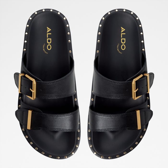 Flat sandals in black leather - ELYNA