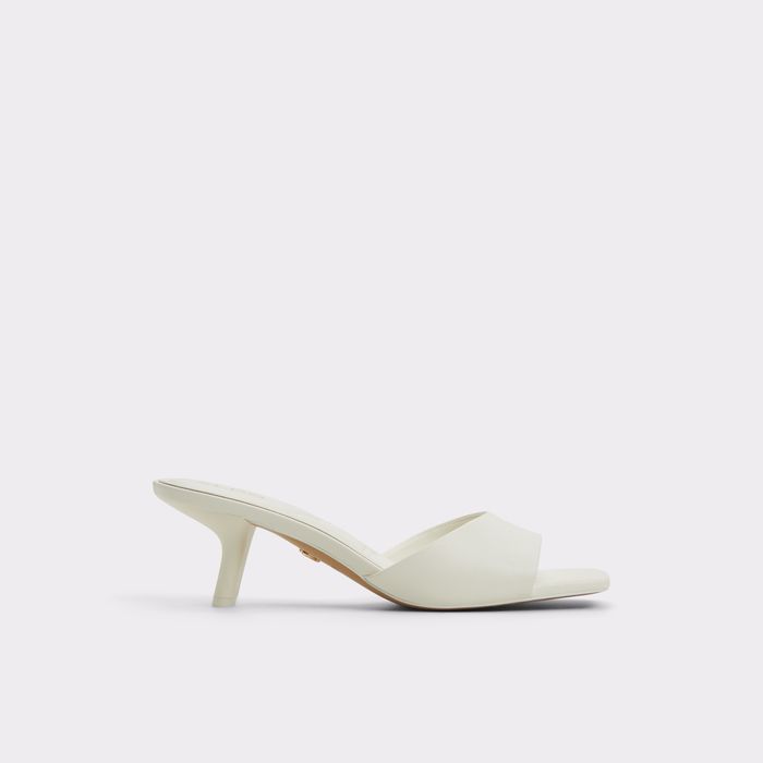 Kitten heeled mules in white - ENCHANTING