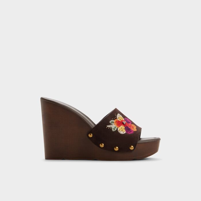 Wedge heeled mules in brown leather - GROUNDED
