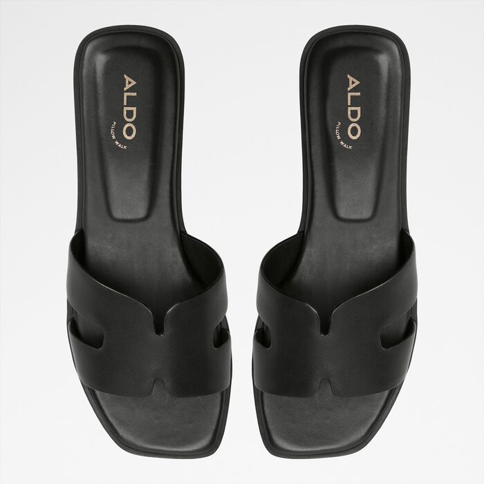 Flat sandals in black leather - ITSANDAL