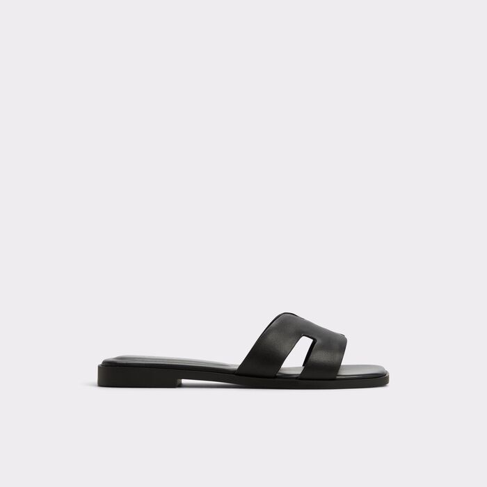 Flat sandals in black leather - ITSANDAL
