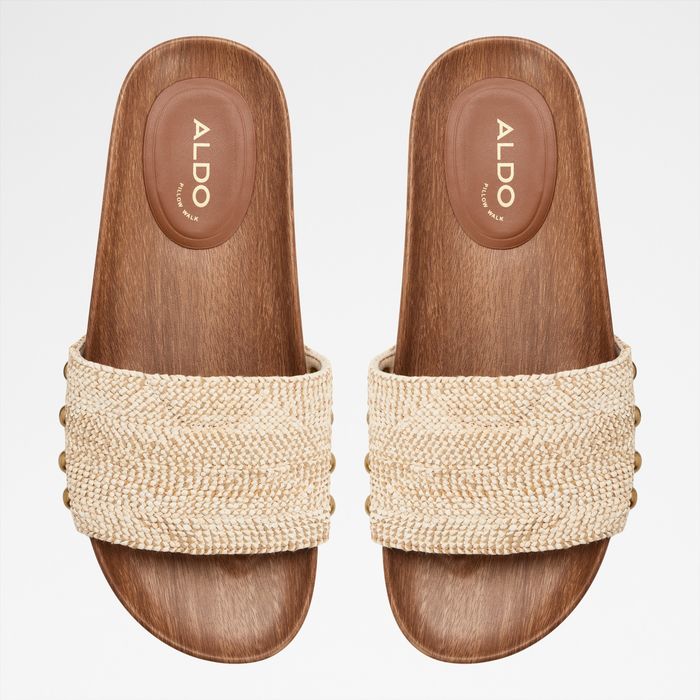 Flat sandals in beige - ROOTED