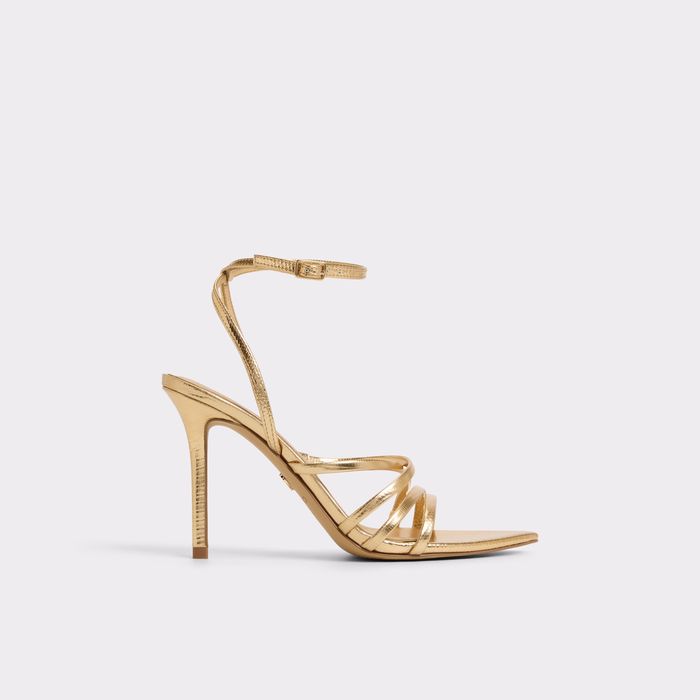 Stiletto heeled sandals in gold - SOLANIA