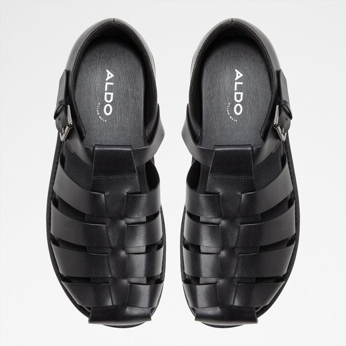 Sandals in black leather - WILDHAVEN