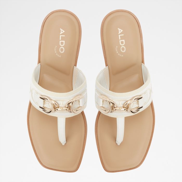 Flat sandals in beige - CORALYNNA
