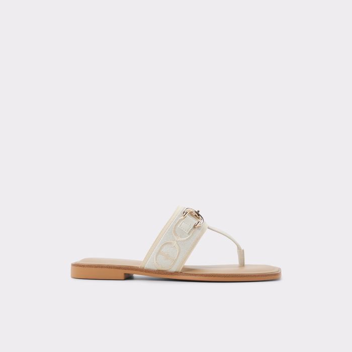 Flat sandals in beige - CORALYNNA