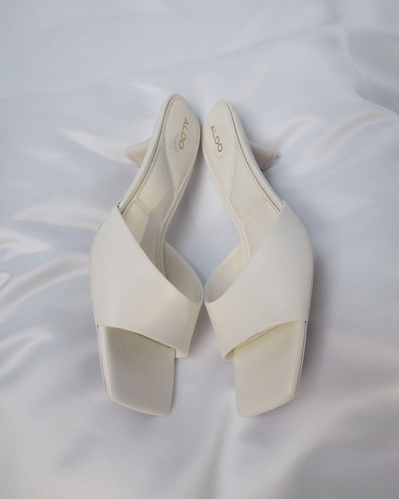 Kitten heeled mules in white - ENCHANTING