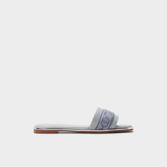 Flat sandals in blue leather - TENDRE-IN