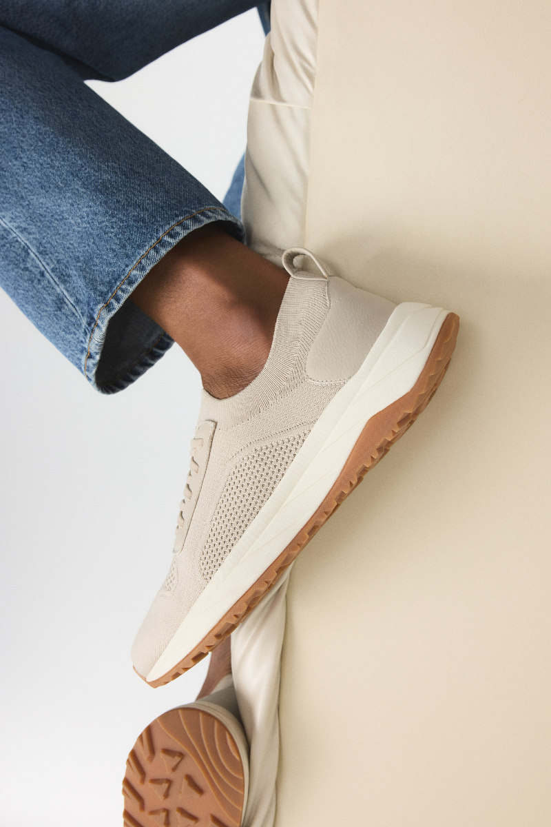 Beige knit sneakers with white sole and rubber outsole