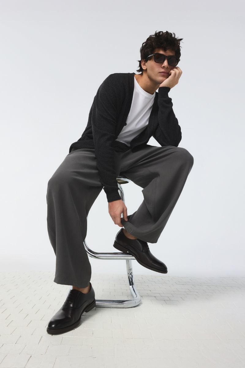 Black leather dress shoes with classic sole.