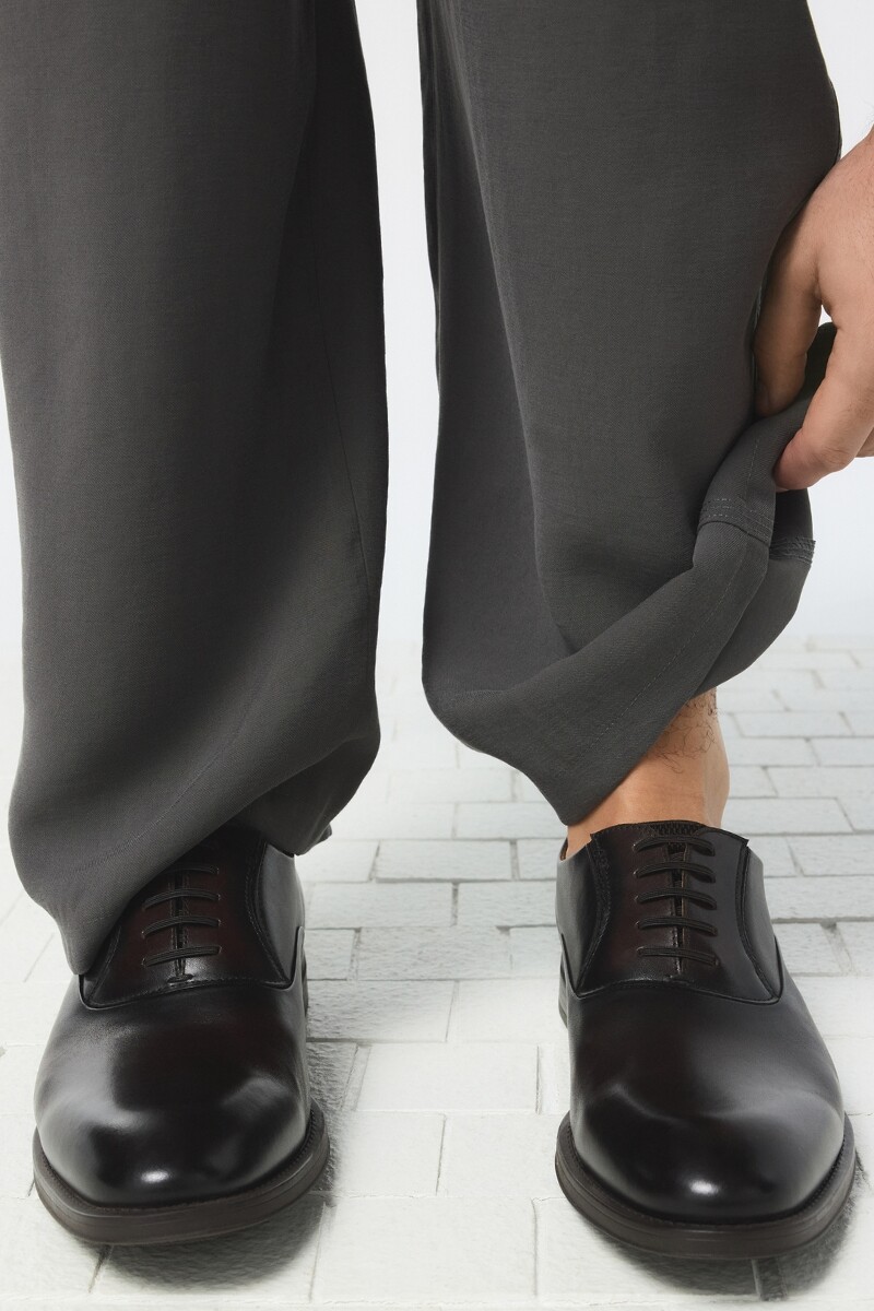 Men’s black ALDO lace-up dress shoes, viewed from the front.