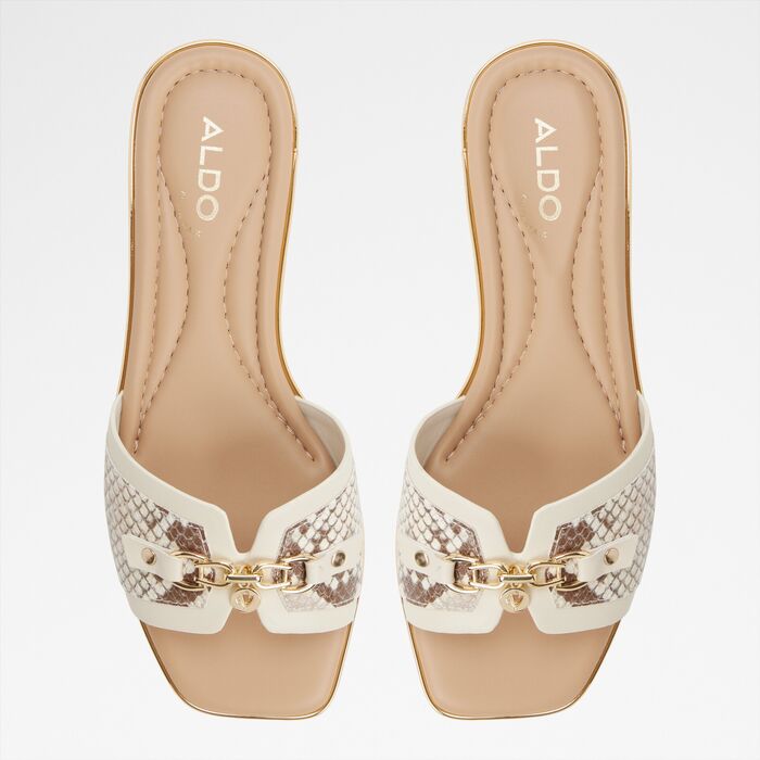 Sandalias planas en beige - ALAMASSI