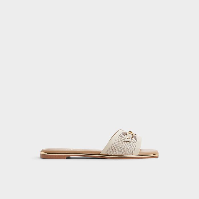 Sandalias planas en beige - ALAMASSI
