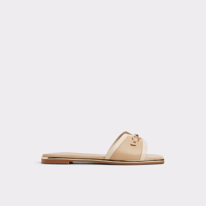 Sandalias planas en beige - ALAMASSI