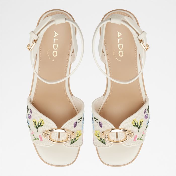 Sandalias de cuña en beige - CARRABRIRIEL
