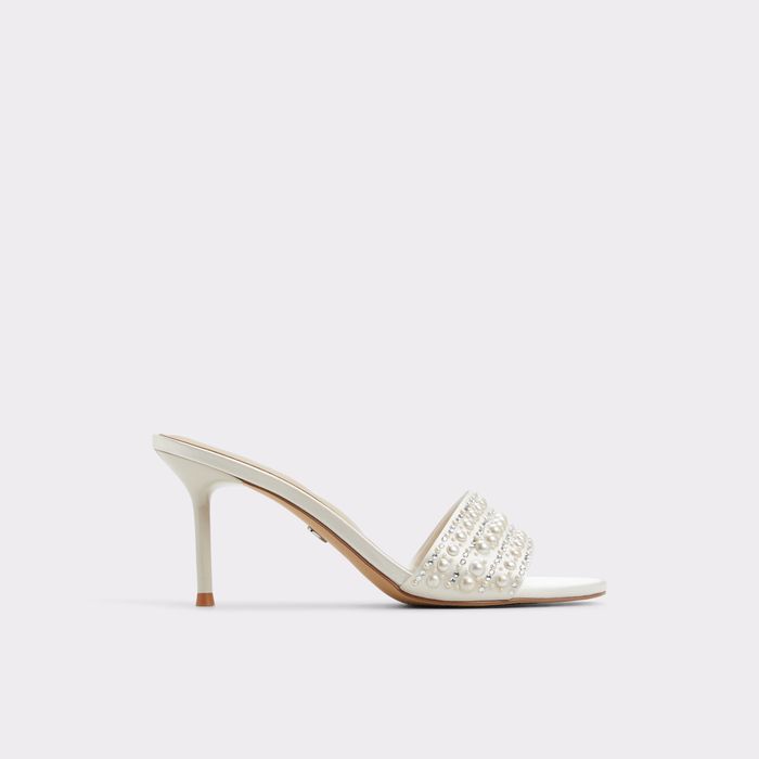 Mules en blanco, tacón de aguja - ETERNALLY