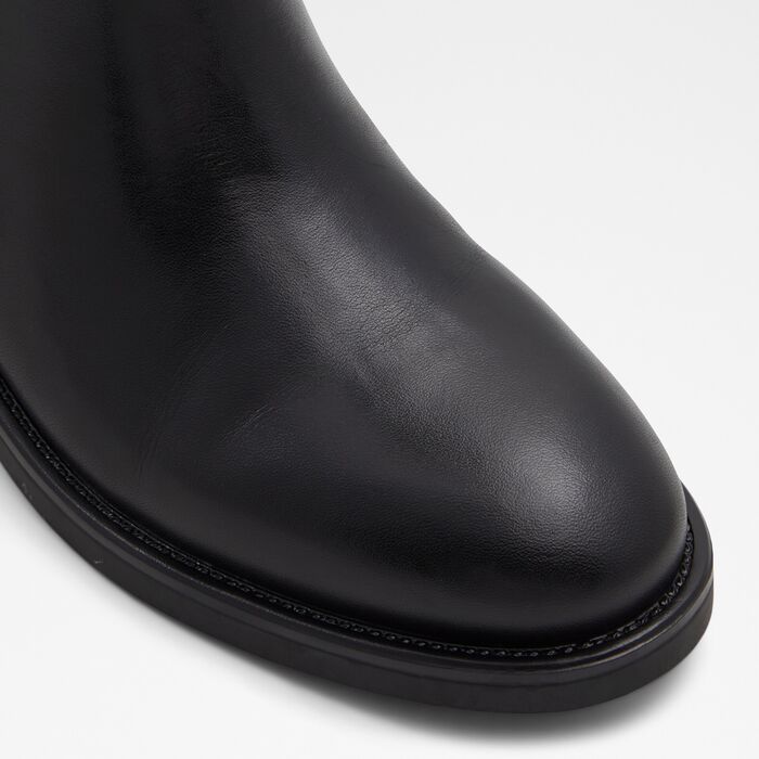 Botas planas ALDO para mujer, en piel, en negro, con puntera redonda y un detalle metálico LOREINA001001043