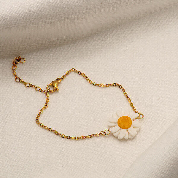 Pulseira com margarida fio dourado