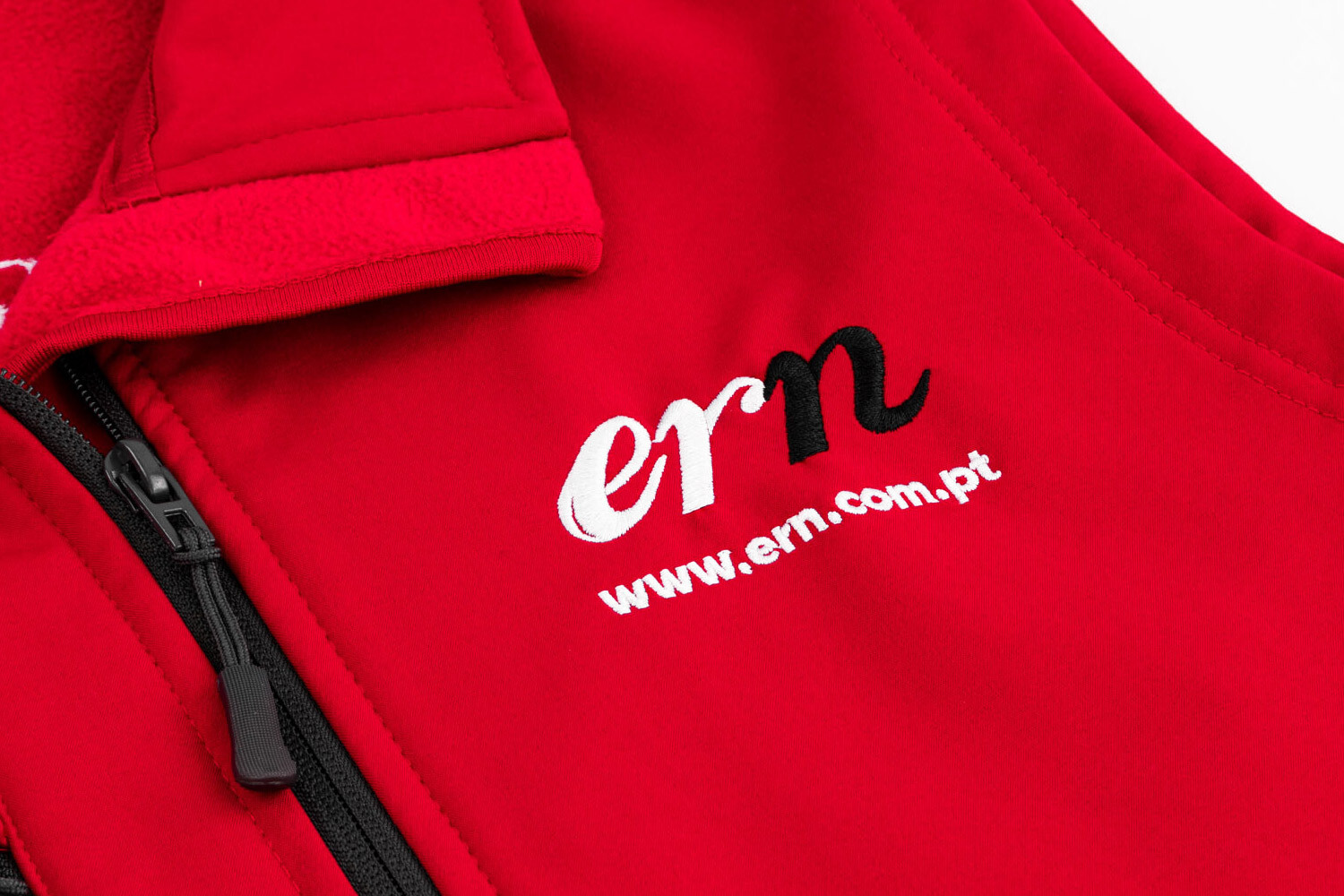 red waterproof jacket vest with embroidered logo