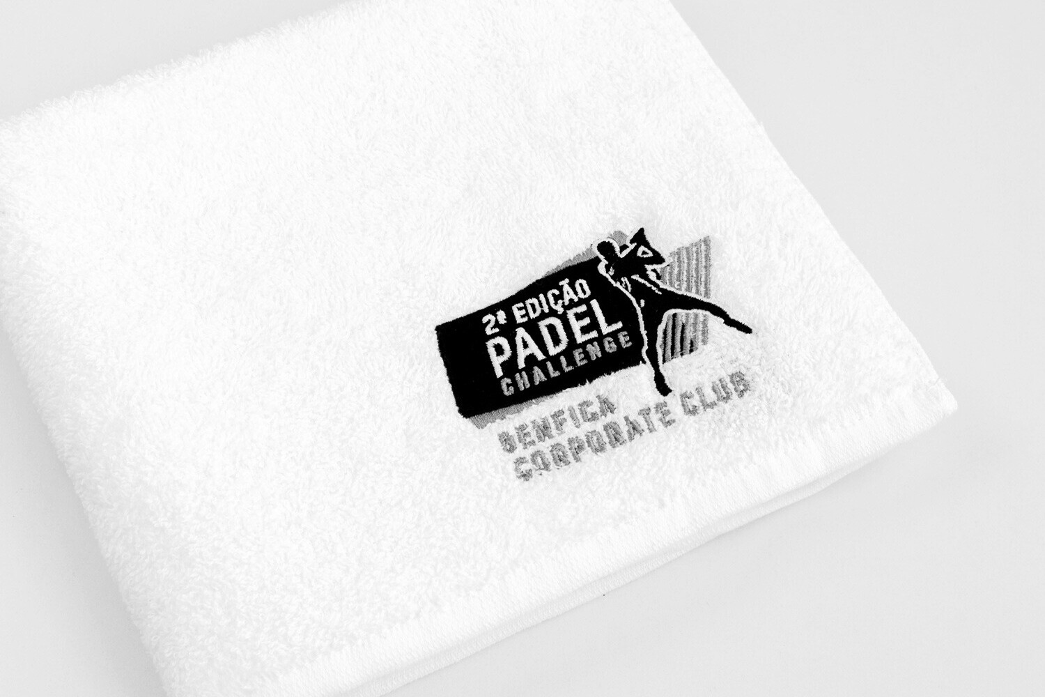 white gym padel towel with embroidered logo