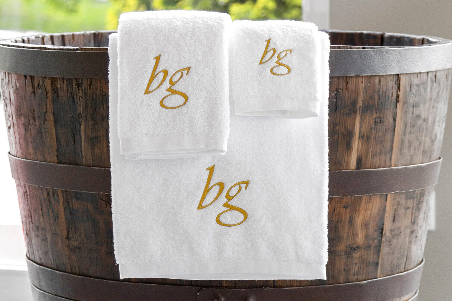 white hotel bath towels with embroidered logo