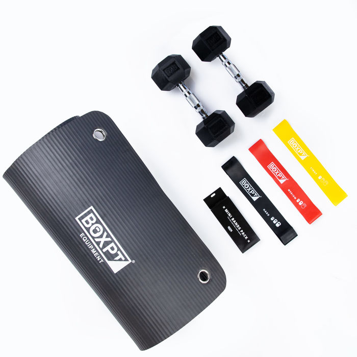 Black exercise mat, two hex dumbbells and three coloured resistance bands on white background