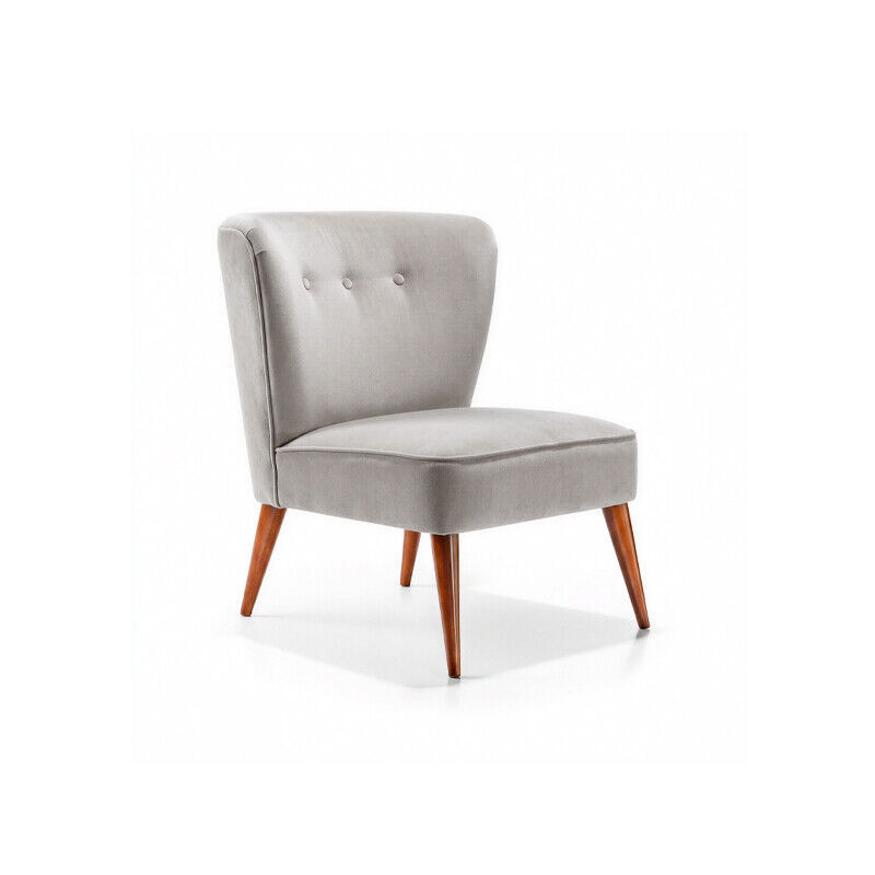 Upholstered Cosma armchair in Velvet – Fog, developed for hospitality and contract environments.