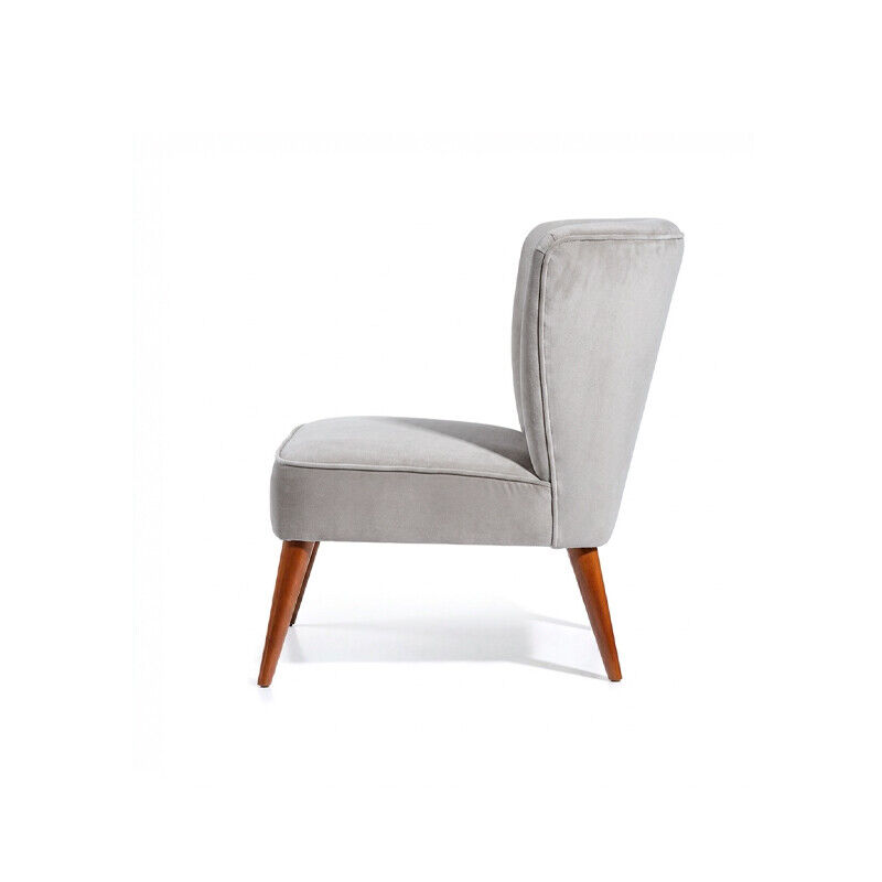 Upholstered Cosma armchair in Velvet – Fog, developed for hospitality and contract environments.