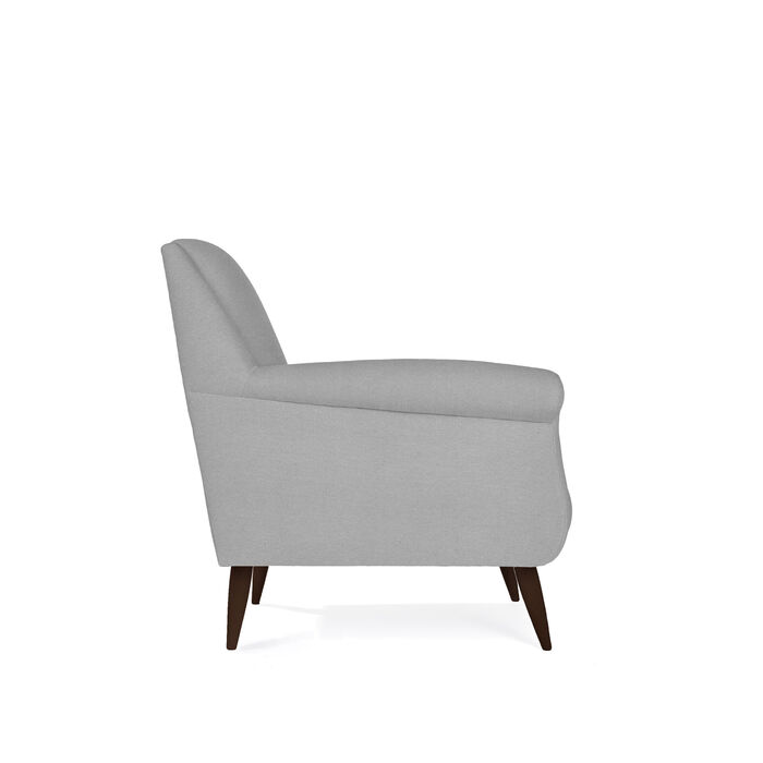 Selene Armchair by HDL – upholstered in Velvet – Fog with extra-matte dark ash legs and a retro-influenced silhouette. Handcrafted in Portugal for hospitality and contract interiors.
