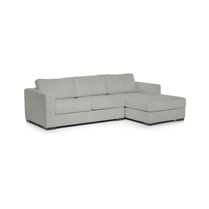 Span upholstered sofa with chaise in Linen Feel – Silver, resting on solid ash feet.