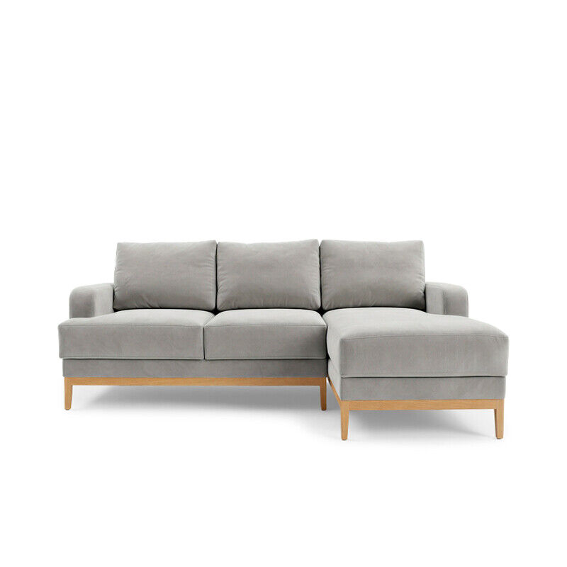 Node upholstered sofa with chaise, in Velvet – Fog, resting on solid ash feet.