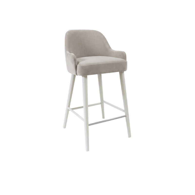 Solara Bar Chair – upholstered in Velvet – Fog with solid ash legs and a stainless-steel footrest, built for hospitality and contract use.