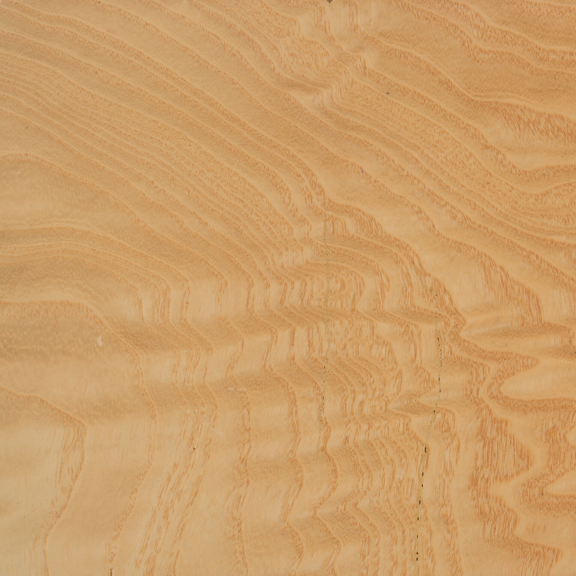 Refined wood veneer sheets showcasing unique textures and patterns for luxury furniture