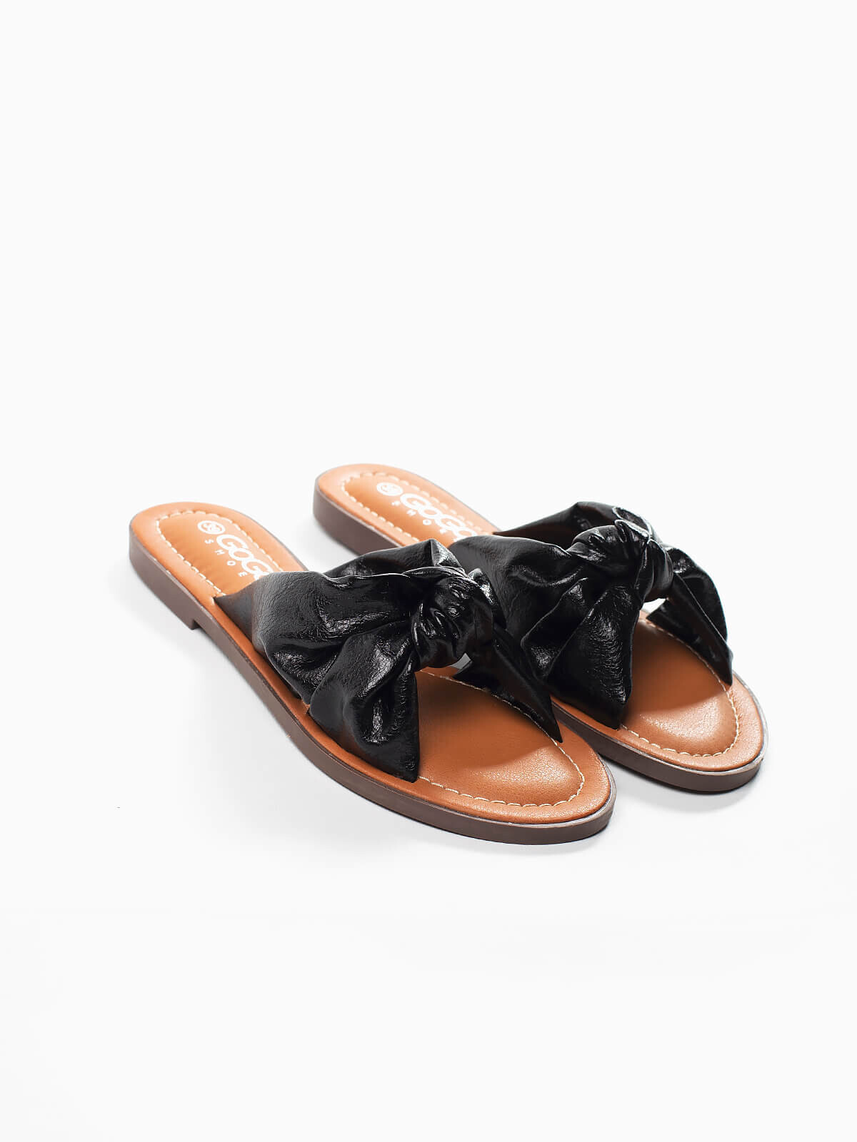 Sandalias planas negras con lazo