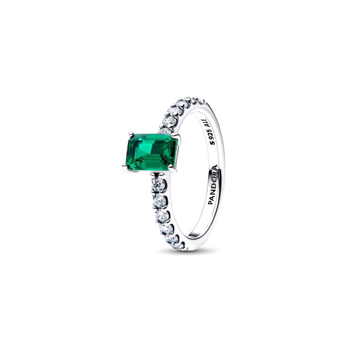 Anel Pandora para mulher prateado com uma zircónia central verde e zircónias brancas em volta.