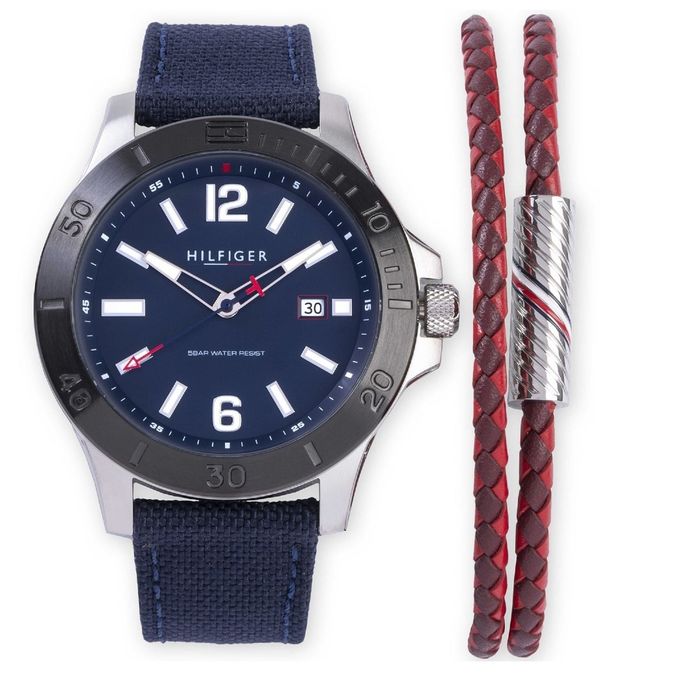 Relógio Tommy Hilfiger de bracelete azul e uma pulseira em couro vermelho com um fecho prateado.