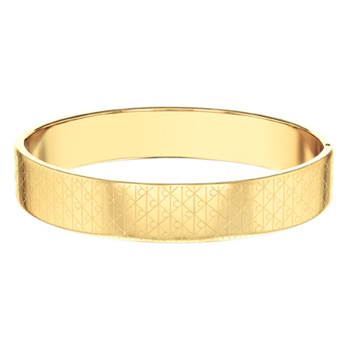 Escrava feminina Calvin Klein em aço dourado com um padrão sobre a base da imagem da marca.